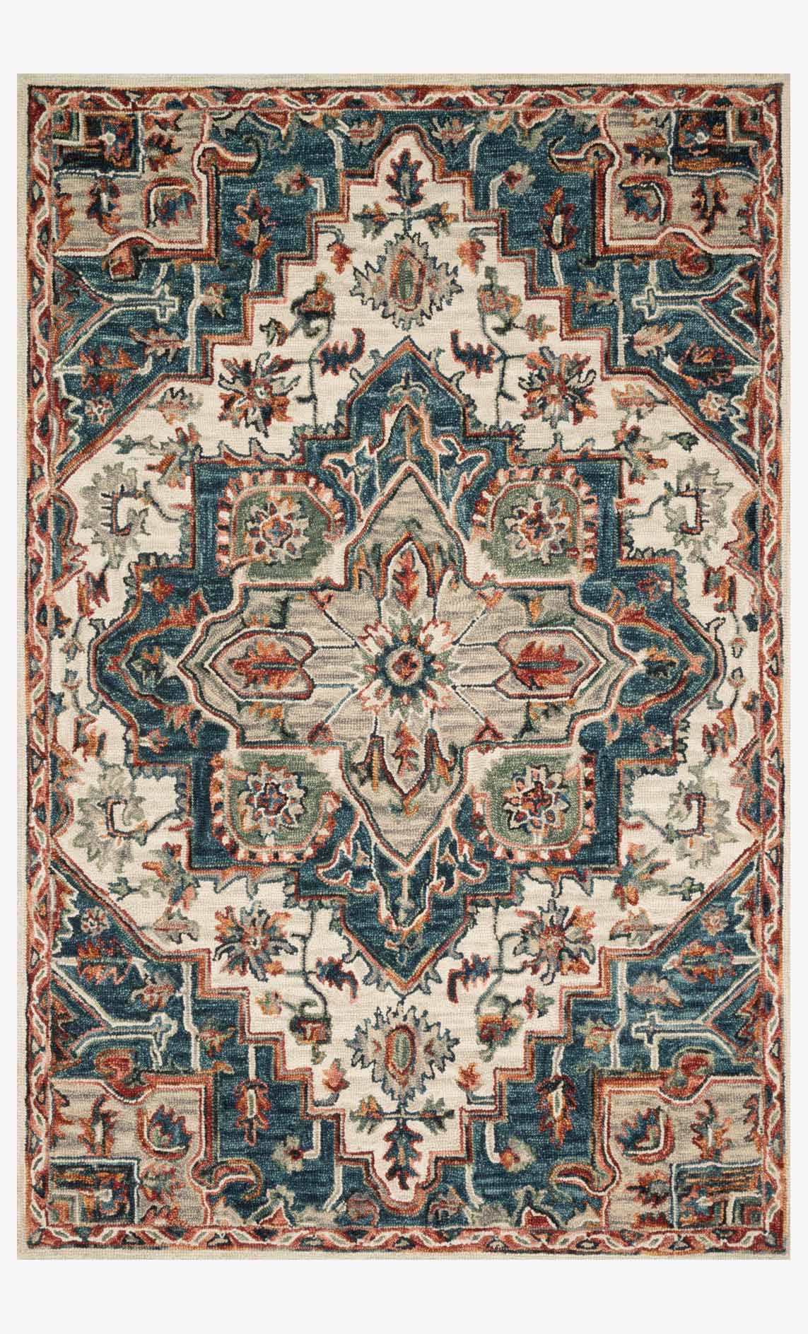 Traditional hooked rug with blue and red geometric medallion pattern on beige ground