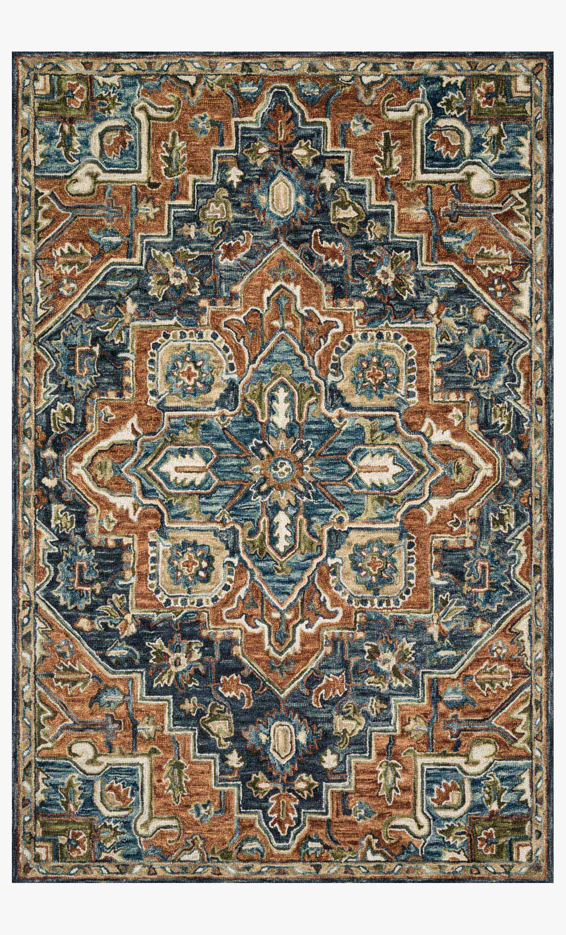 Traditional hooked rug with ornate geometric medallion, rust, teal, navy, and tan colors