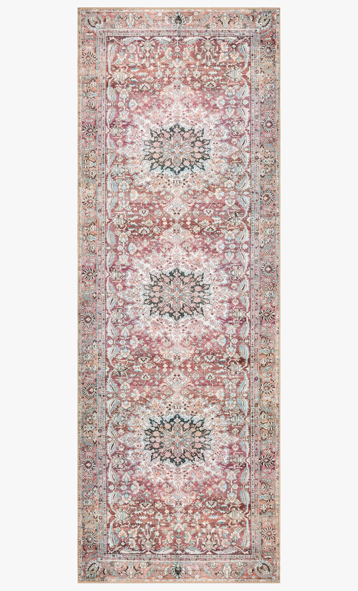 Rectangular traditional rug with pink, teal, and cream repeating decorative motifs