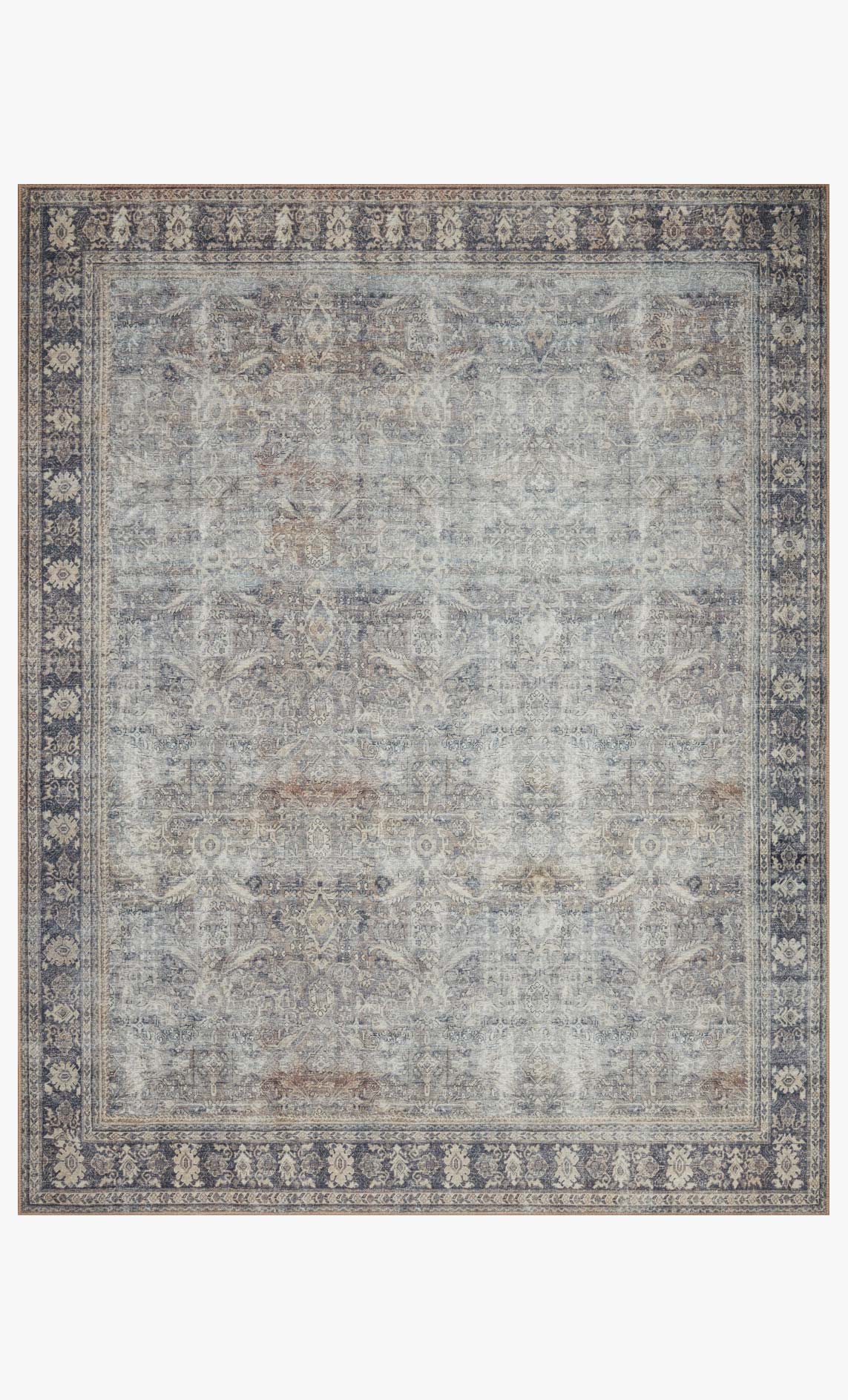 Traditional power-loomed area rug with distressed grey and charcoal pattern border