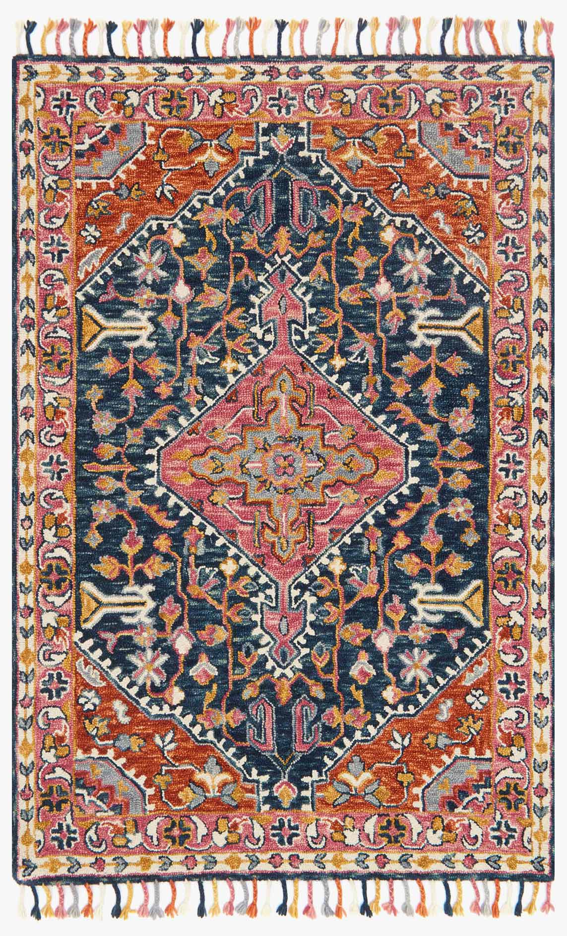 Navy transitional hooked rug with ornate multicolor diamond pattern and fringe edges
