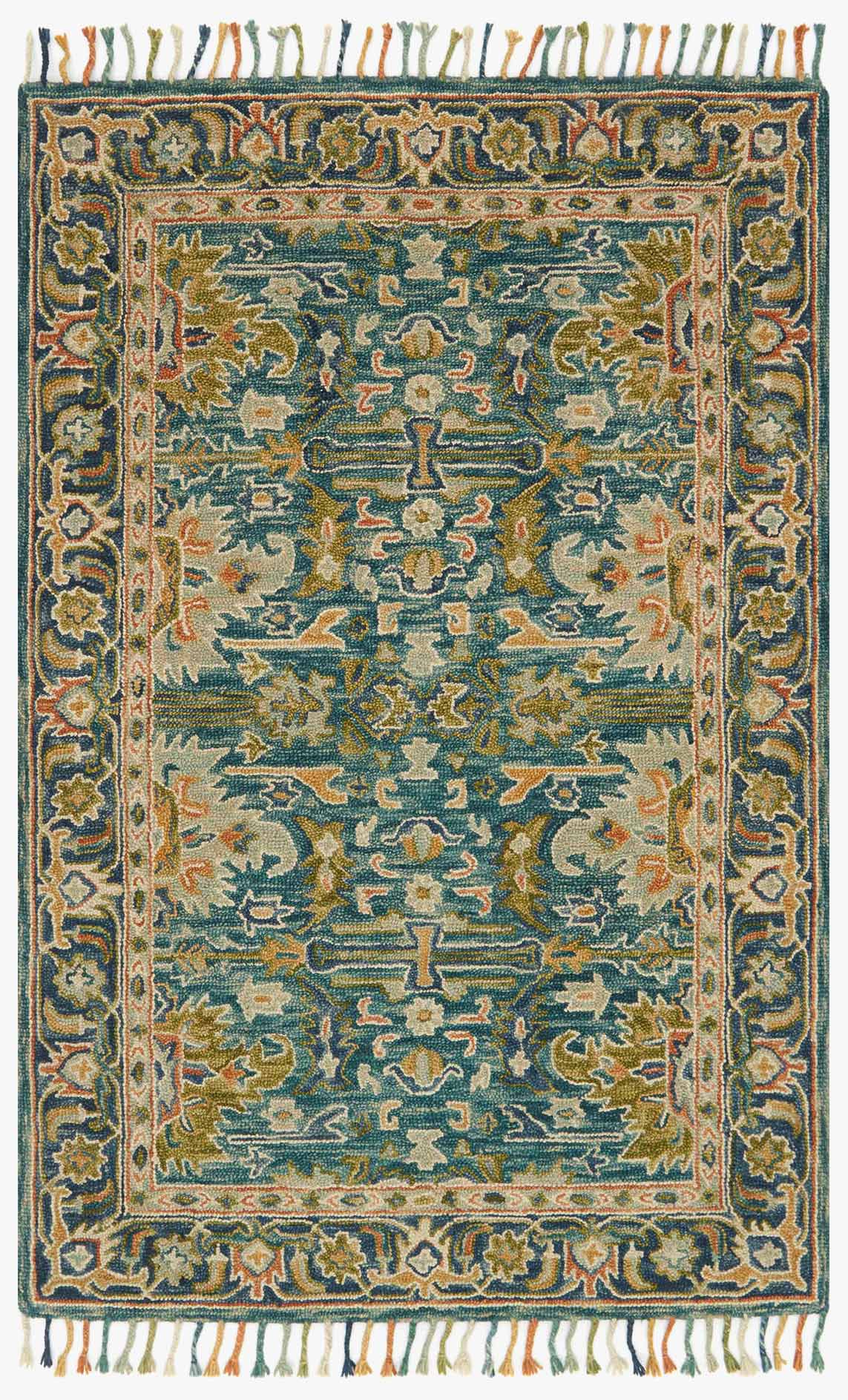 Transitional hooked area rug, blue and navy with ornate border and fringe edges.