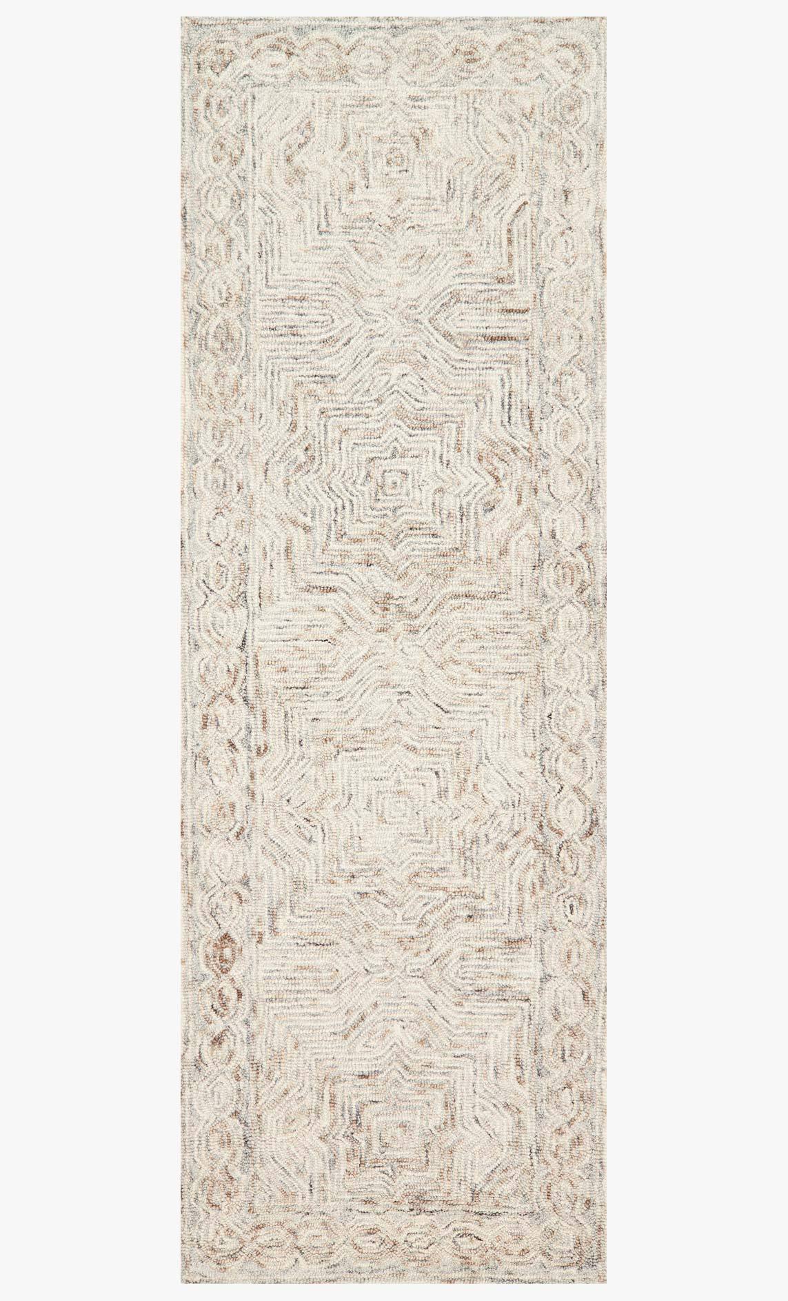 Light beige rectangular rug with repeating geometric maze pattern and textured loop pile