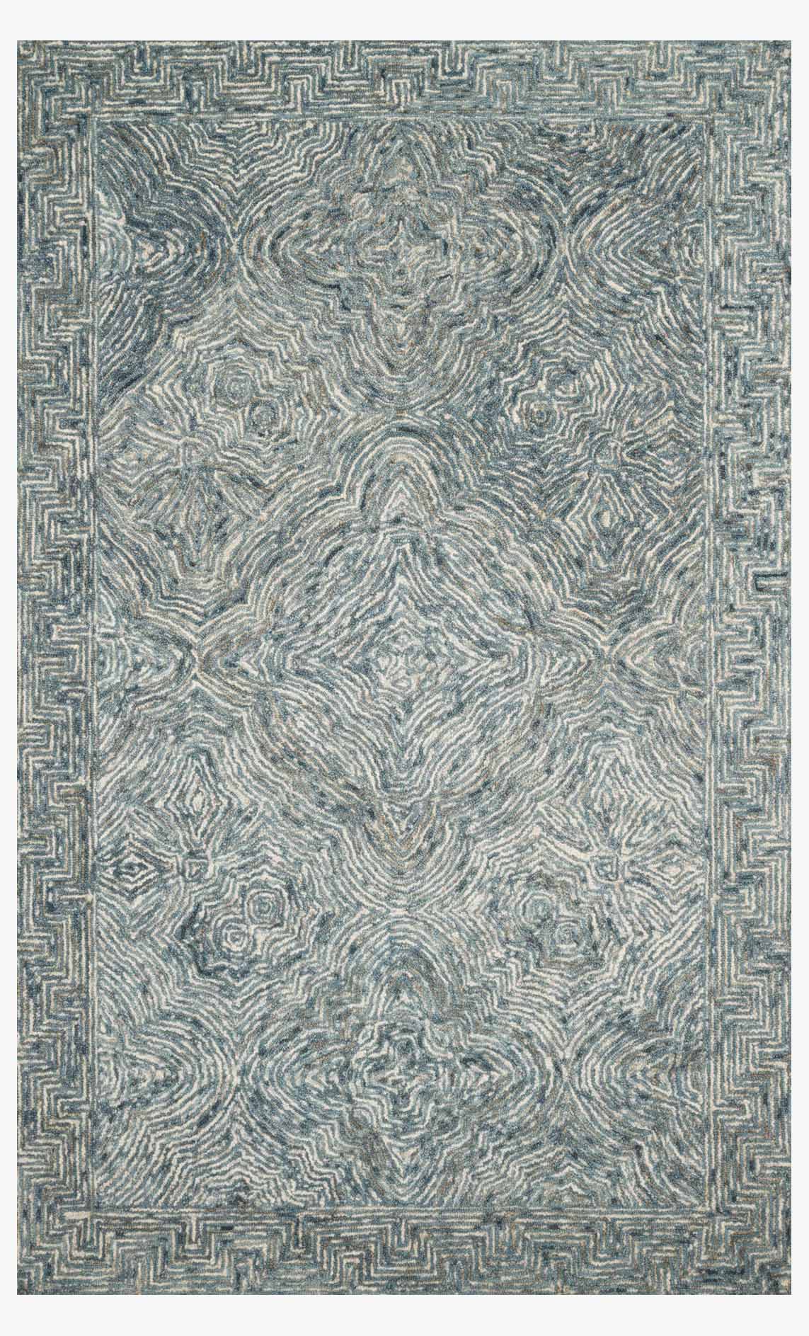 Denim blue hand-tufted rug with ornate maze pattern and Greek key border