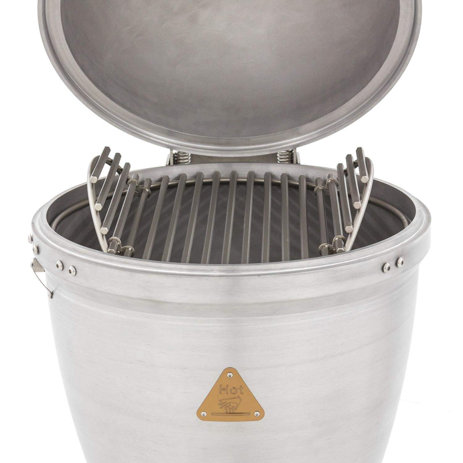 Open kamado grill with vertical cooking grate supports inside the cast aluminum bowl