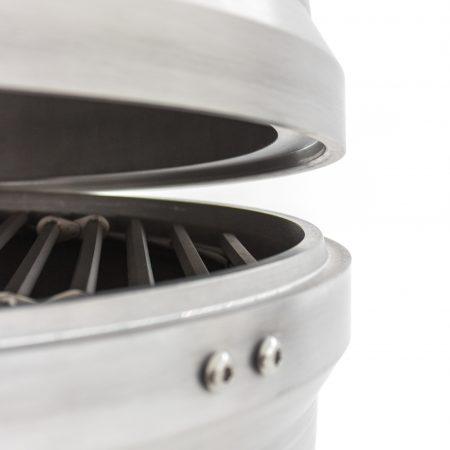 Cast aluminum kamado grill with open lid and two front control knobs