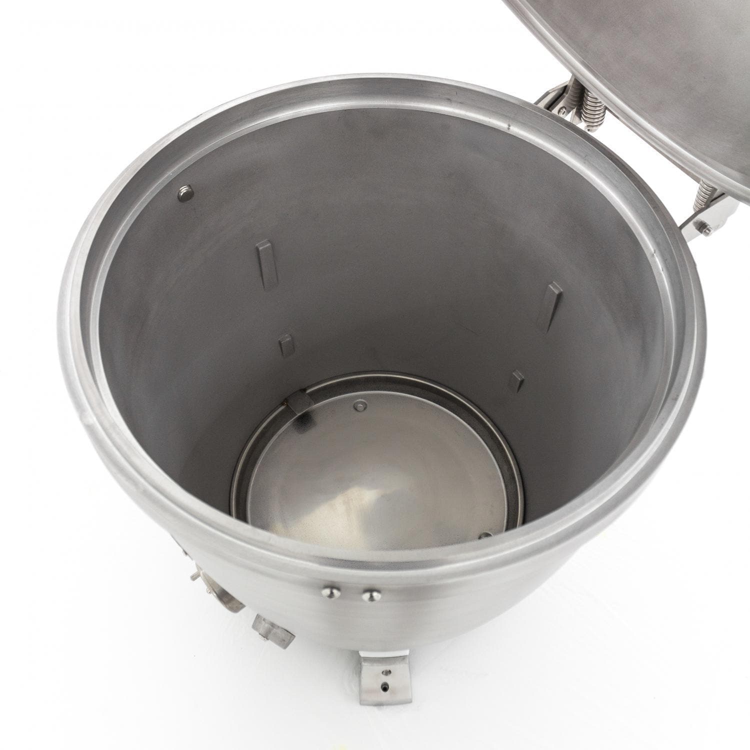 Kamado grill firebox view with lid open and circular inner bowl