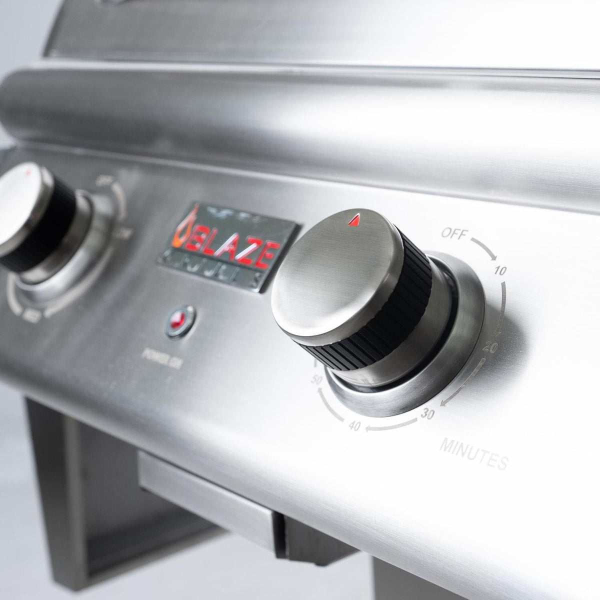 Blaze electric grill knob and temperature settings on stainless control panel