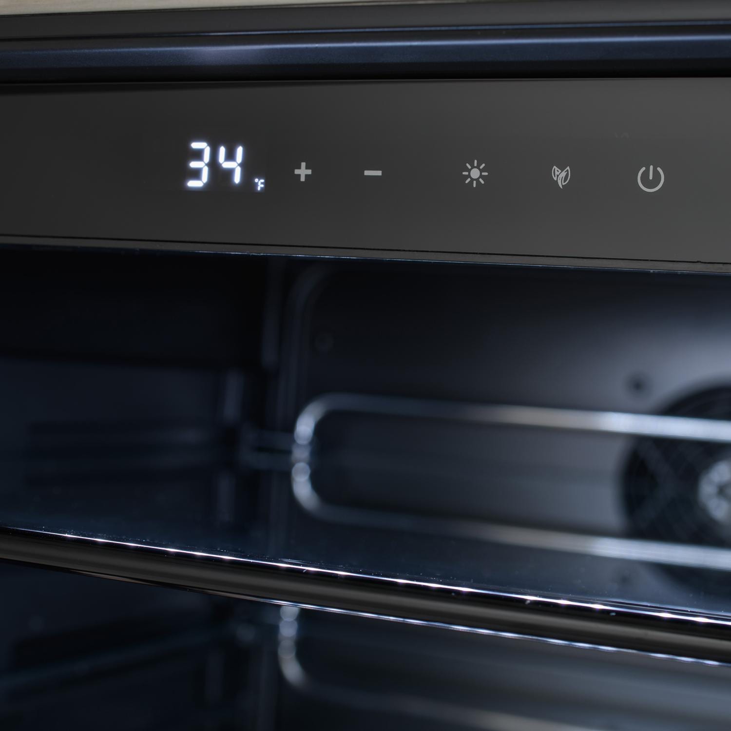 Grill control panel display showing 34° with touch icons
