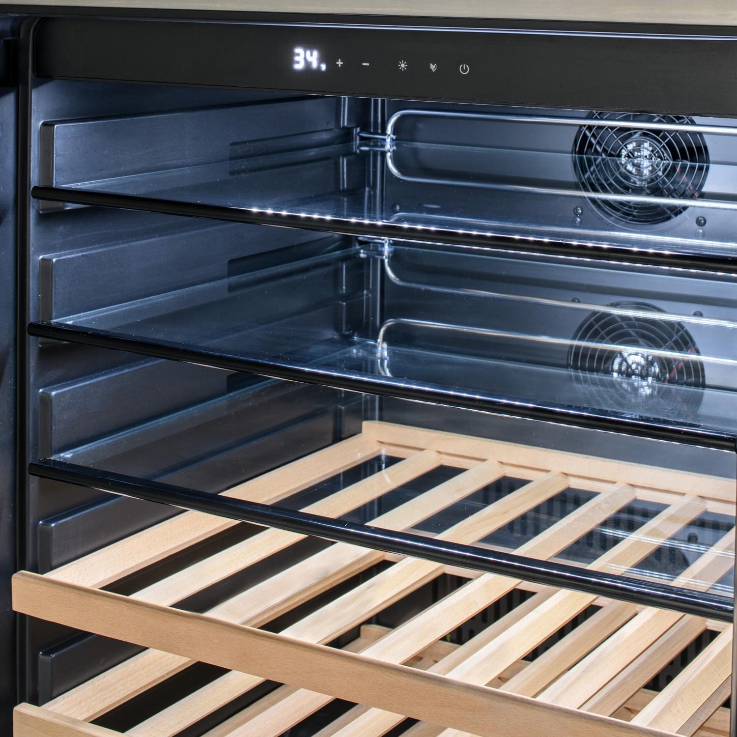 Open built-in propane grill with stainless burners and wooden warming racks