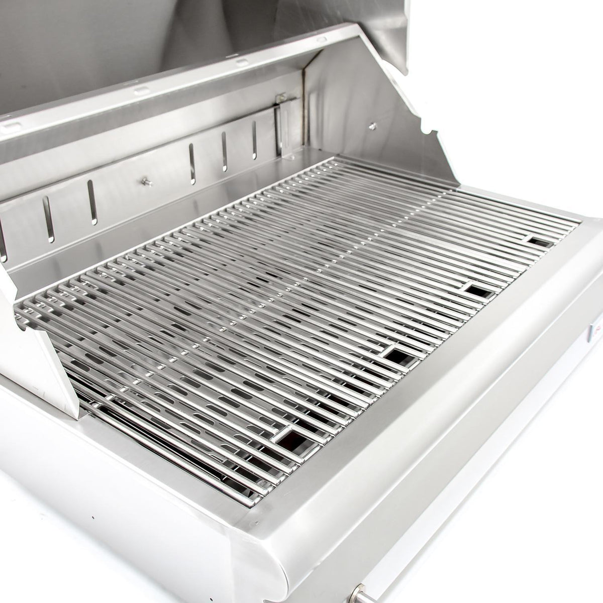 Stainless steel charcoal grill grate inside open hood with recessed firebox
