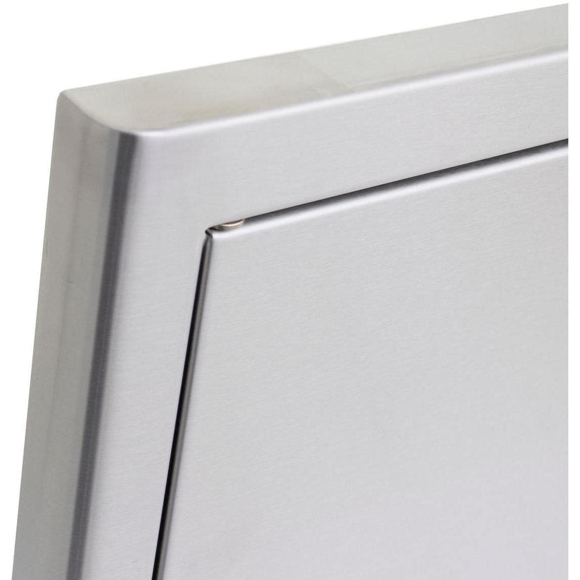 Stainless steel access door with flush edge and recessed handle detail