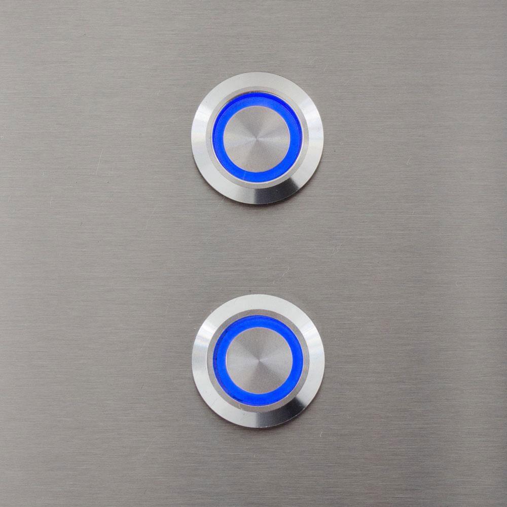 Two round LED control buttons with blue illuminated rings on metal surface
