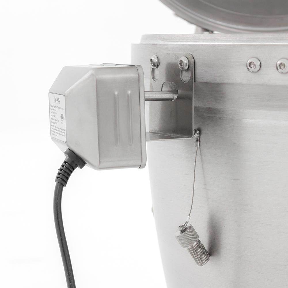 Rotisserie motor with power cord and speed controller attached to grill side