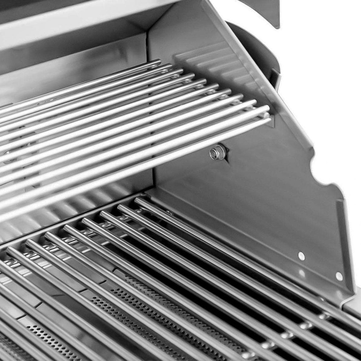 Stainless 3-burner built-in gas grill interior with cooking grates and heat deflector