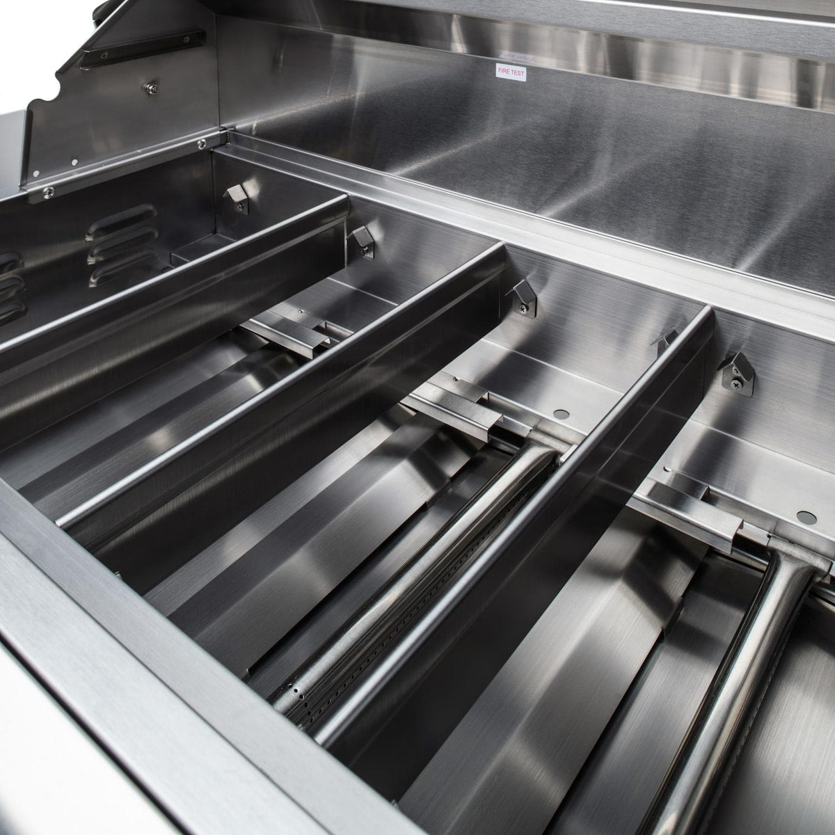 Freestanding 3-burner natural gas grill with open lid and stainless cooking grates