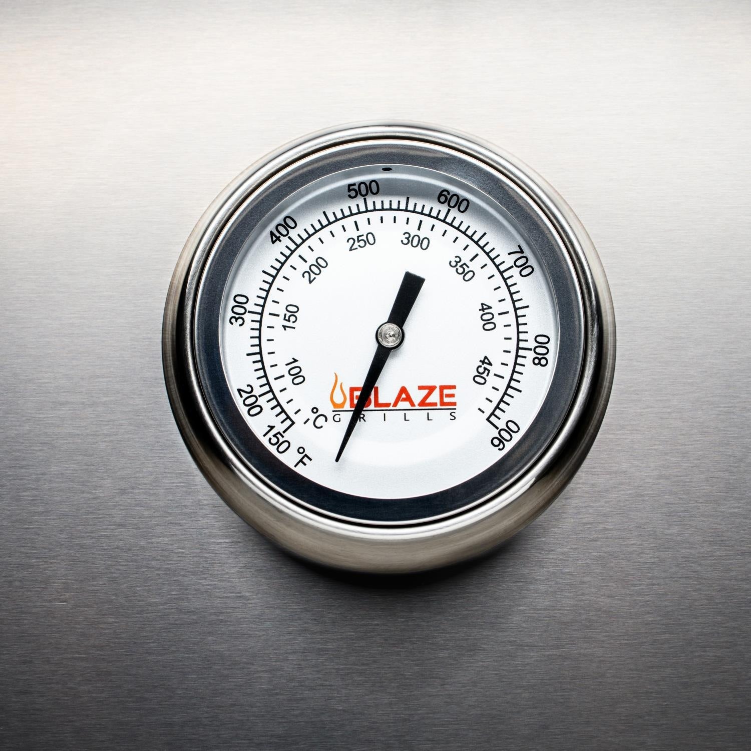 Stainless steel grill thermometer gauge with Blaze Grills logo and temperature scale