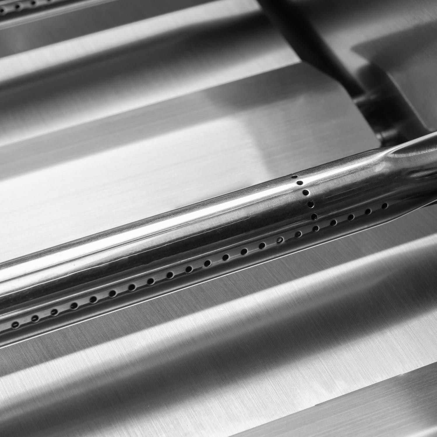 Stainless grill burner bar with rows of ventilation holes