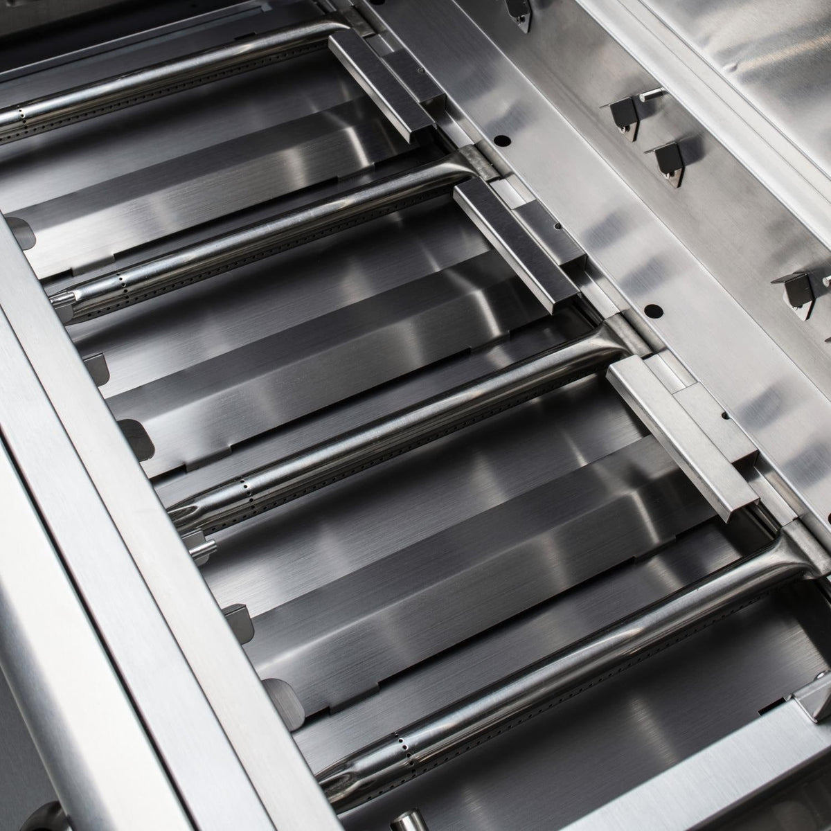 Blaze Prelude stainless steel cooking grates and burner tubes viewed from above