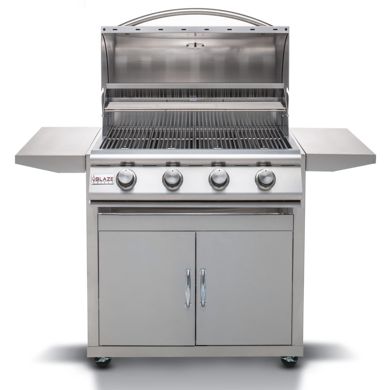 Open 4-burner stainless steel grill showing cooking grates and burner area