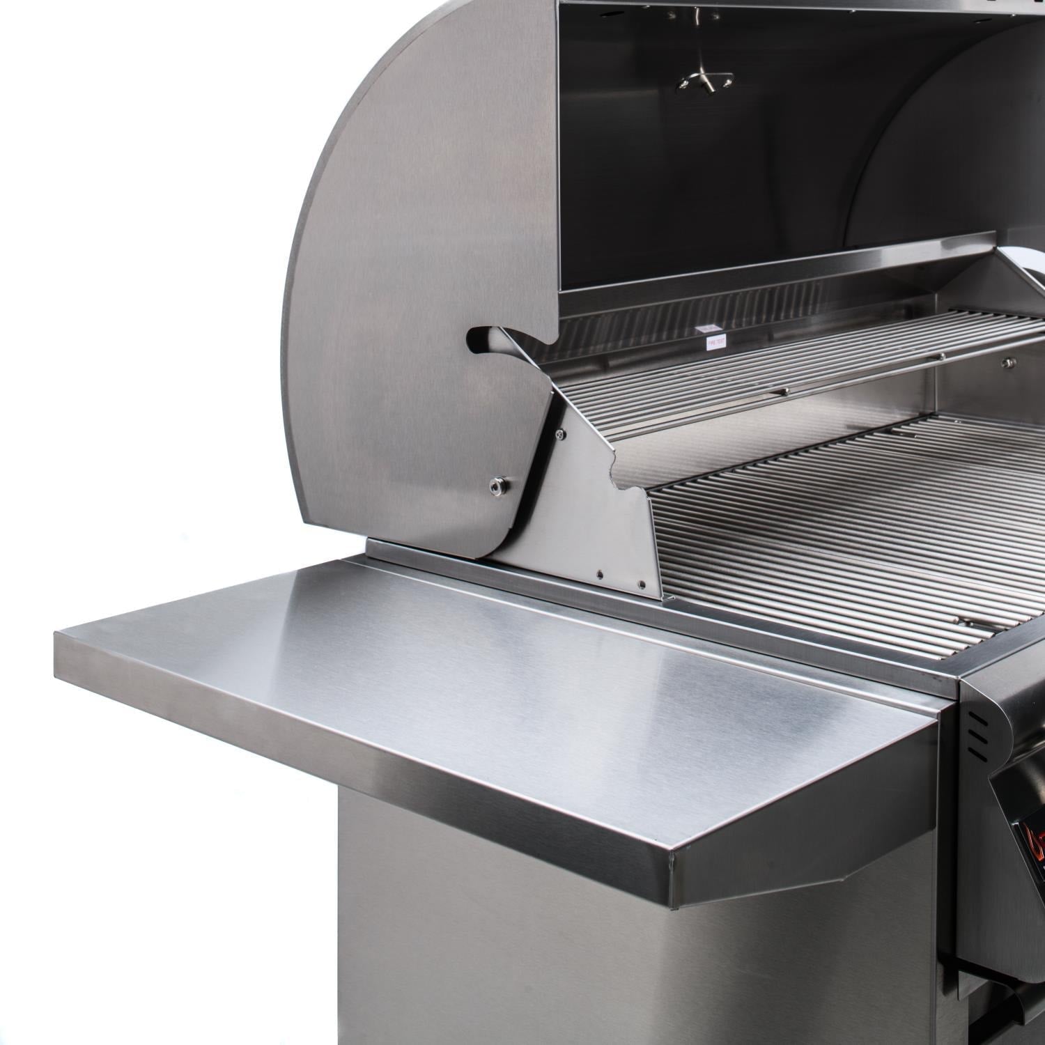 Freestanding stainless gas grill with lid open, side shelf extended, cooking grates visible.