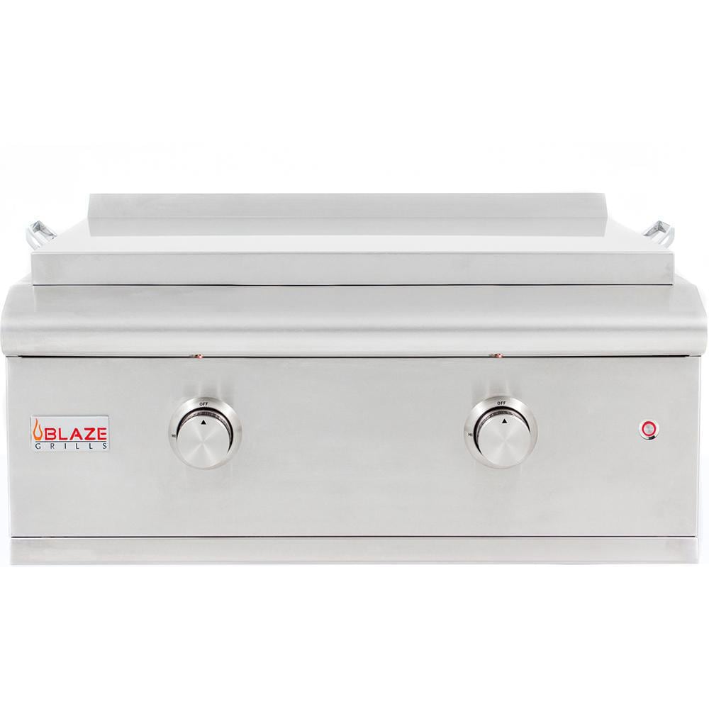 Stainless built-in gas griddle front panel with two control knobs and protected burner cover
