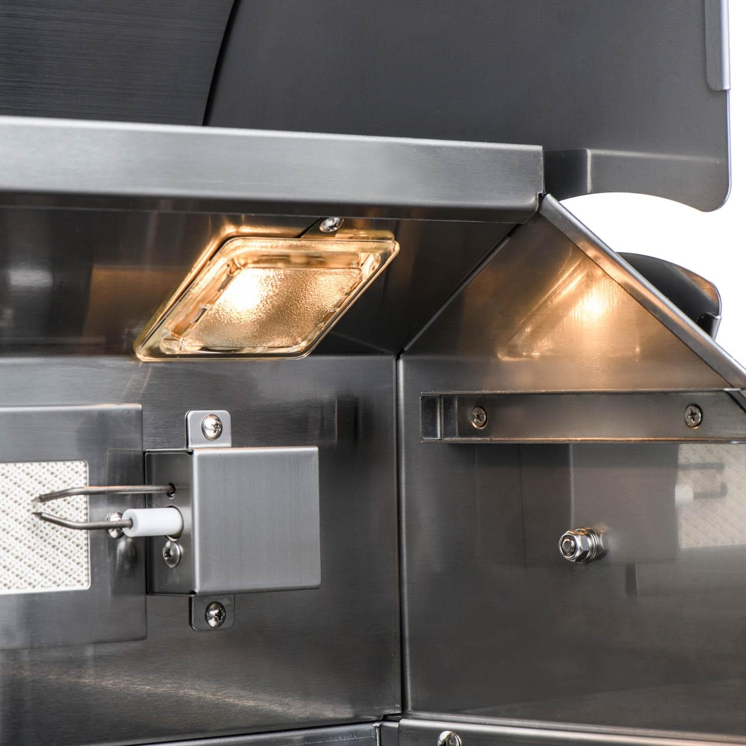 Stainless steel side burner area with a lit infrared burner