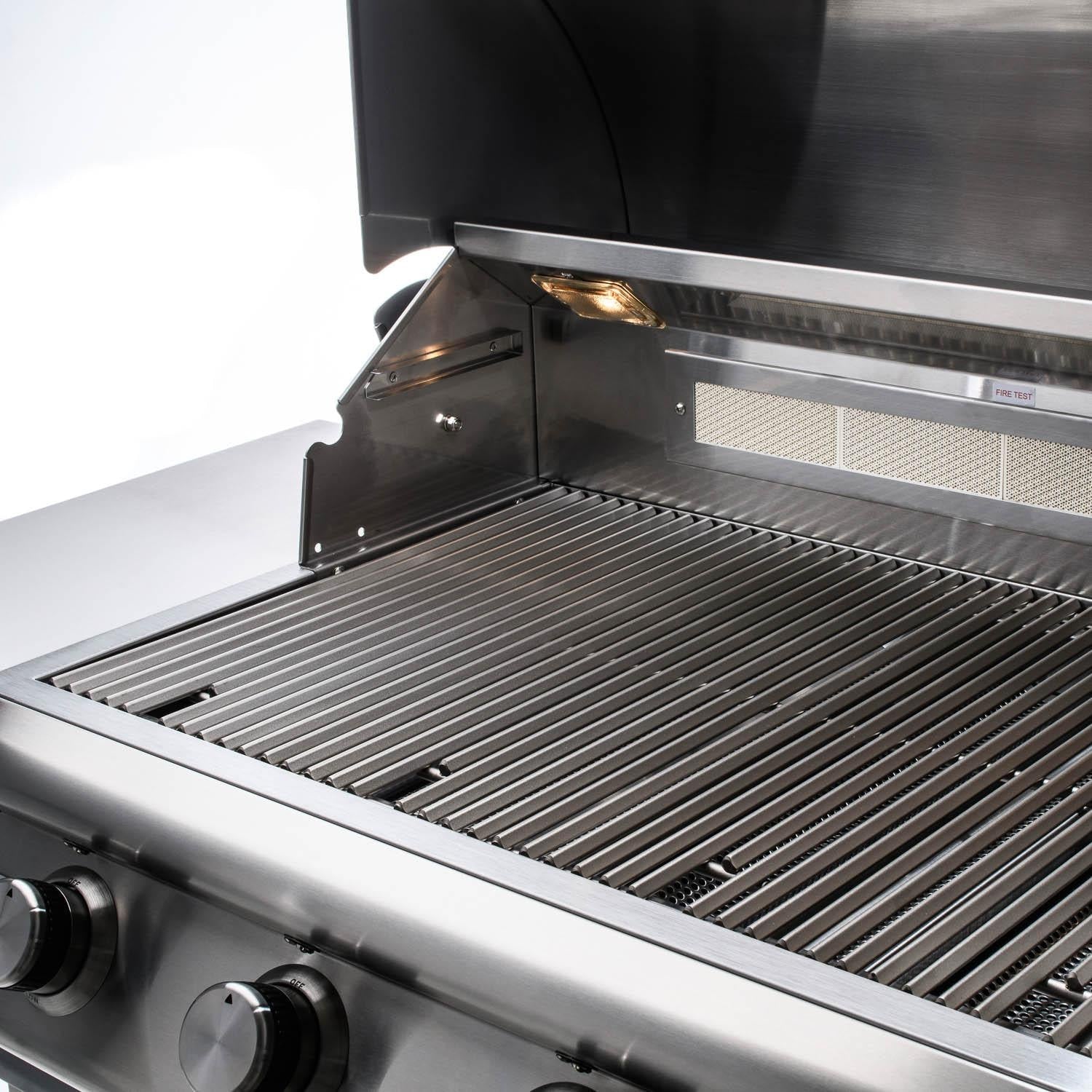 Open stainless steel grill with glowing burners and cooking grates