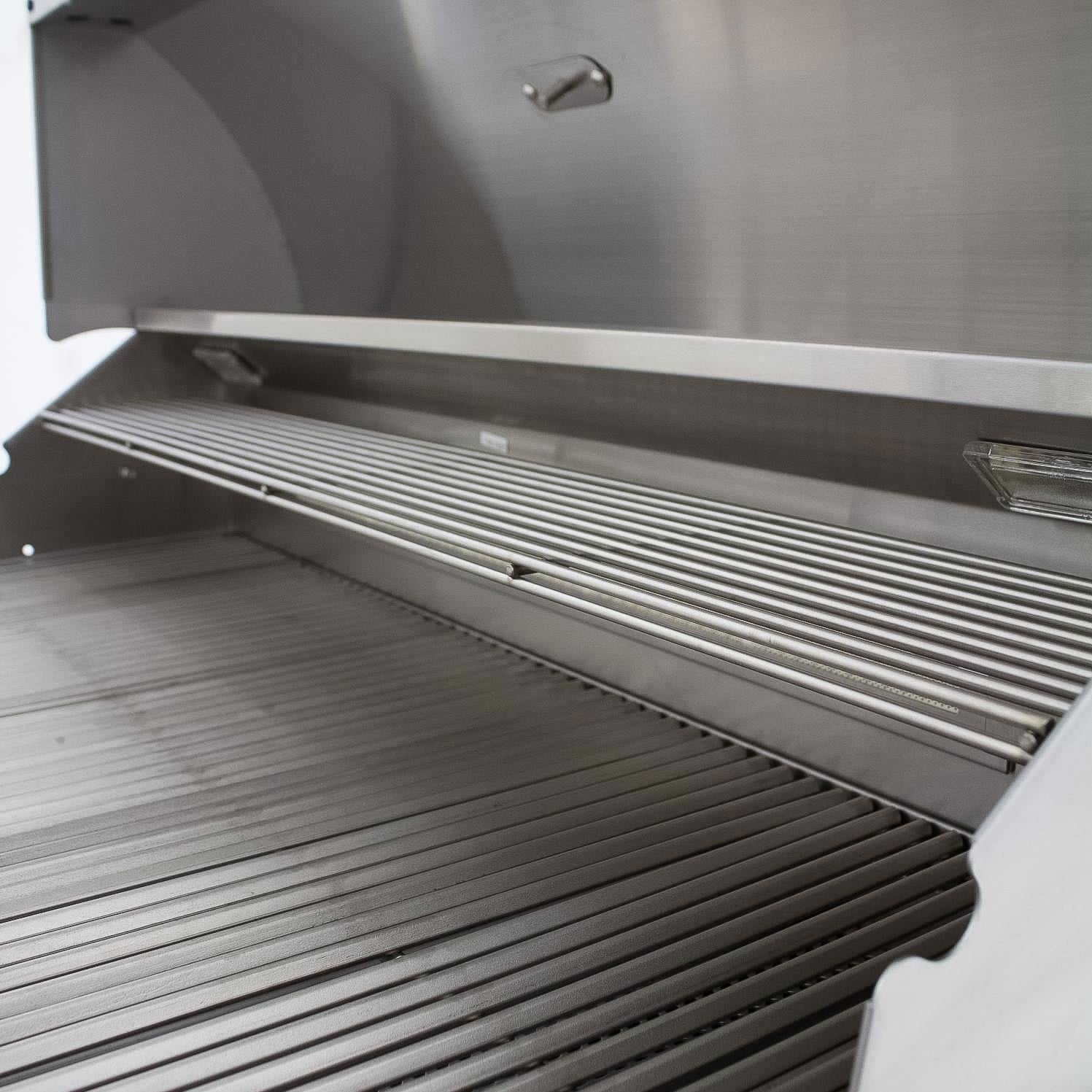 Open stainless steel grill with cooking grates and inner warming shelf