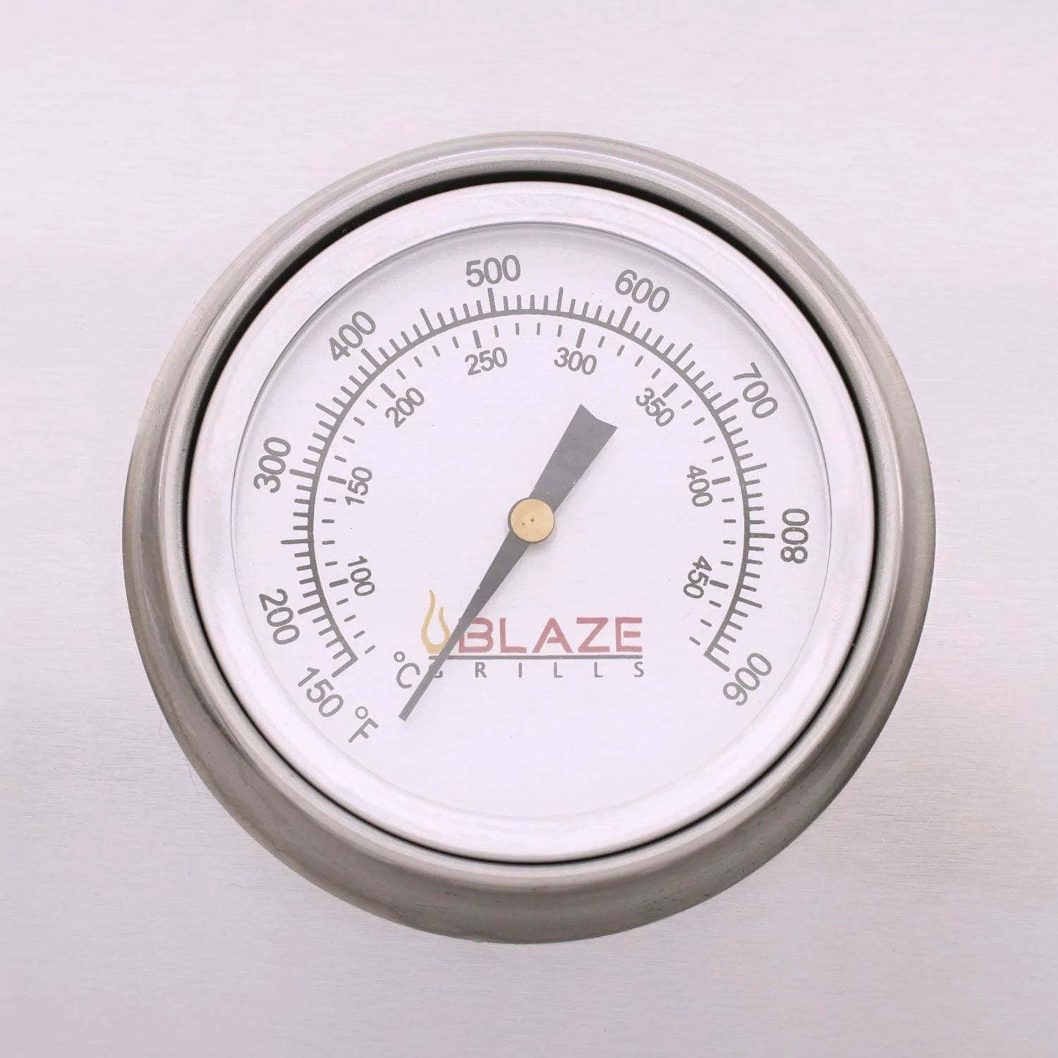 Round grill temperature gauge with dial markings and Blaze GrillS logo