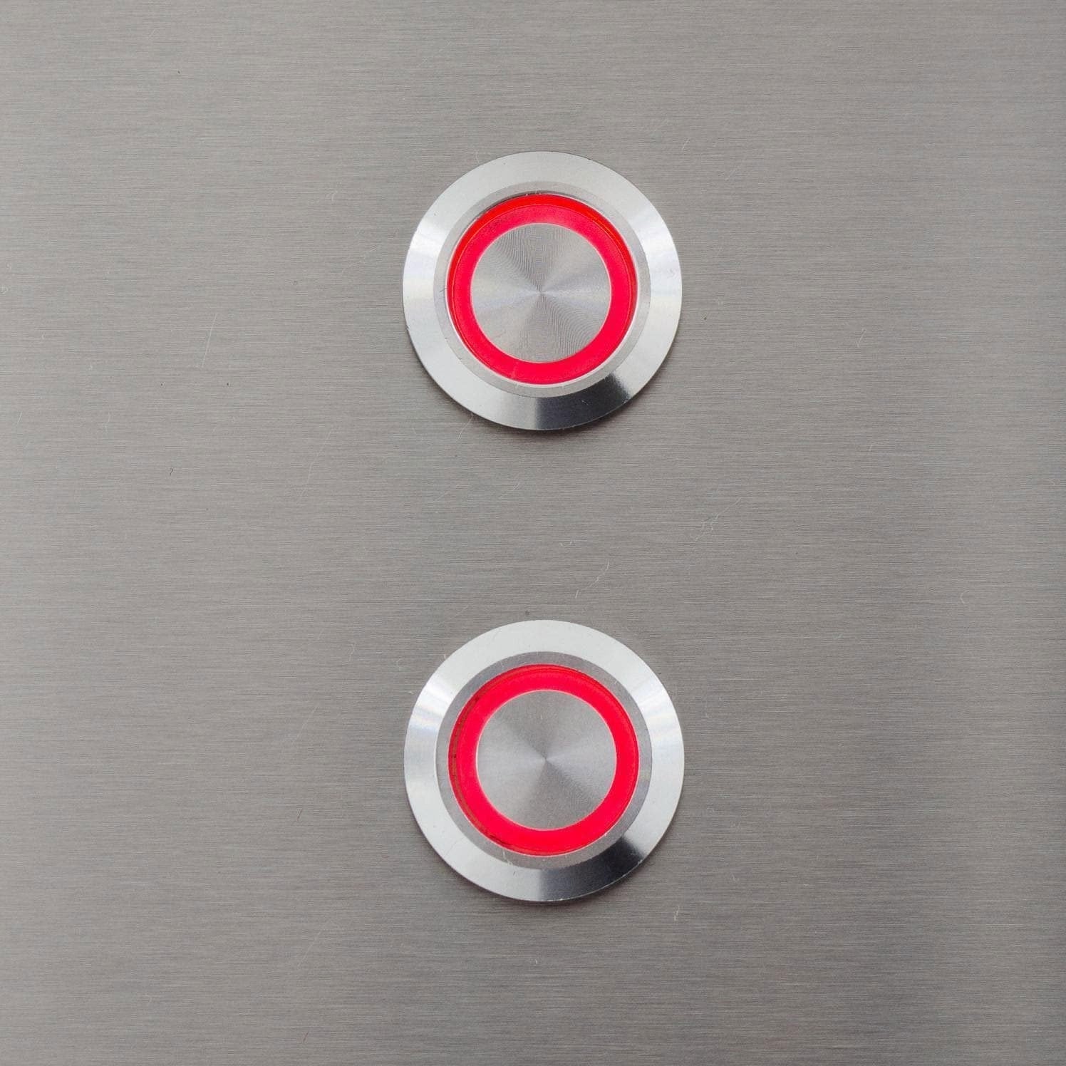 Two stainless steel control knobs with red indicator rings