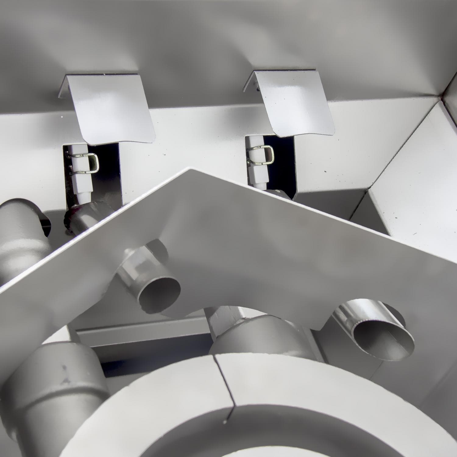 Stainless beverage center interior with vent openings and side mounting brackets