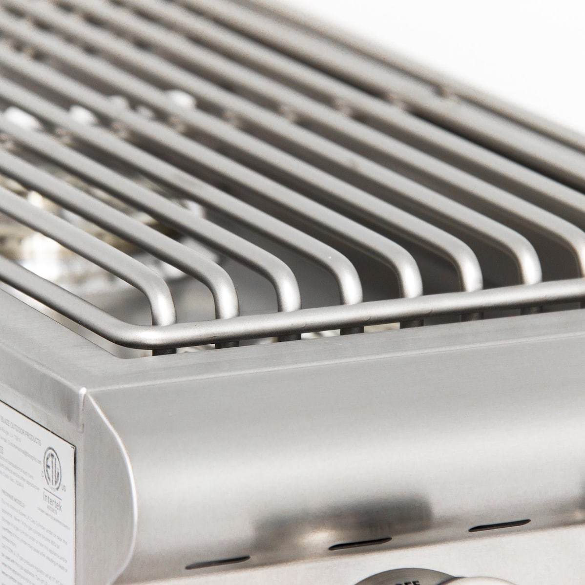 Stainless steel gas grill burner tubes with curved heat shield cover