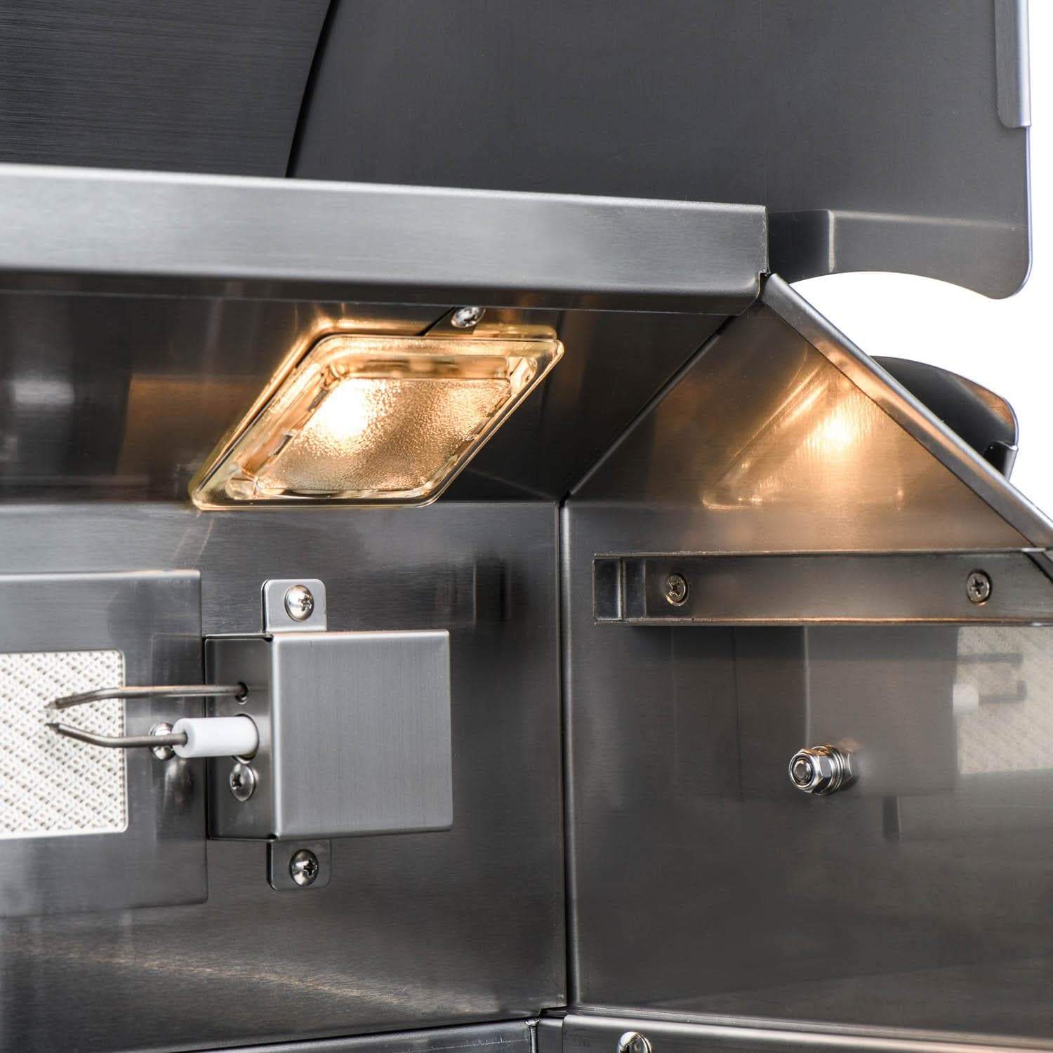 Stainless steel side burner with lit grate and control knobs