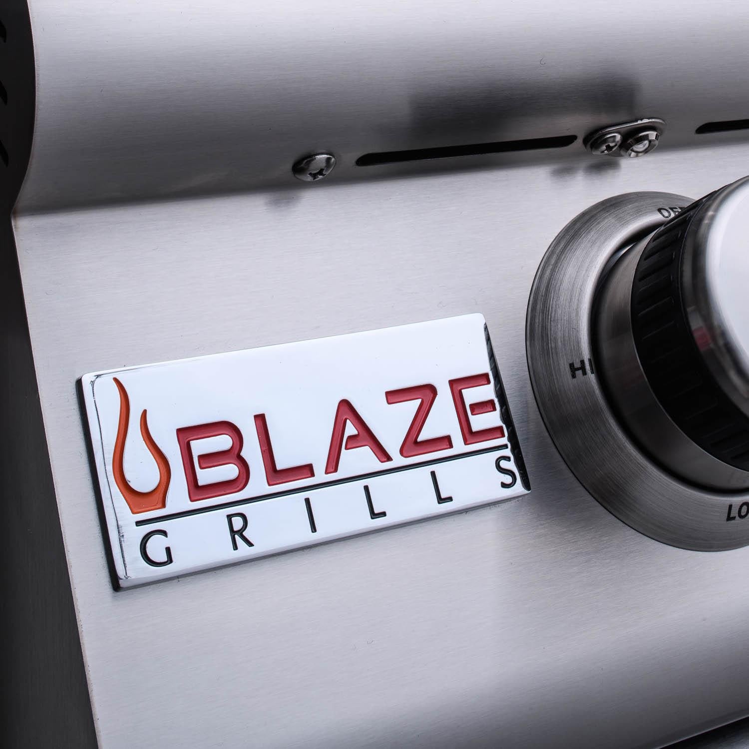 Stainless natural gas grill control panel with Blaze Grill badge logo