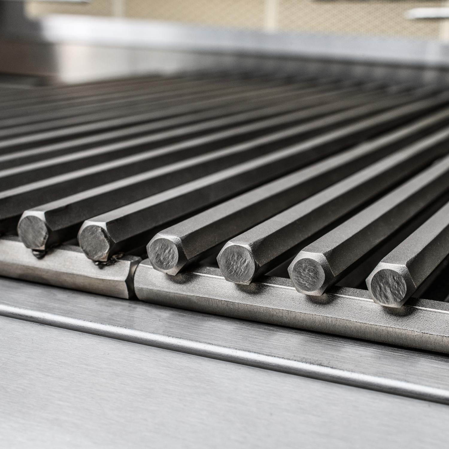 Stainless gas grill cooking grates with evenly spaced cast-style bar tops