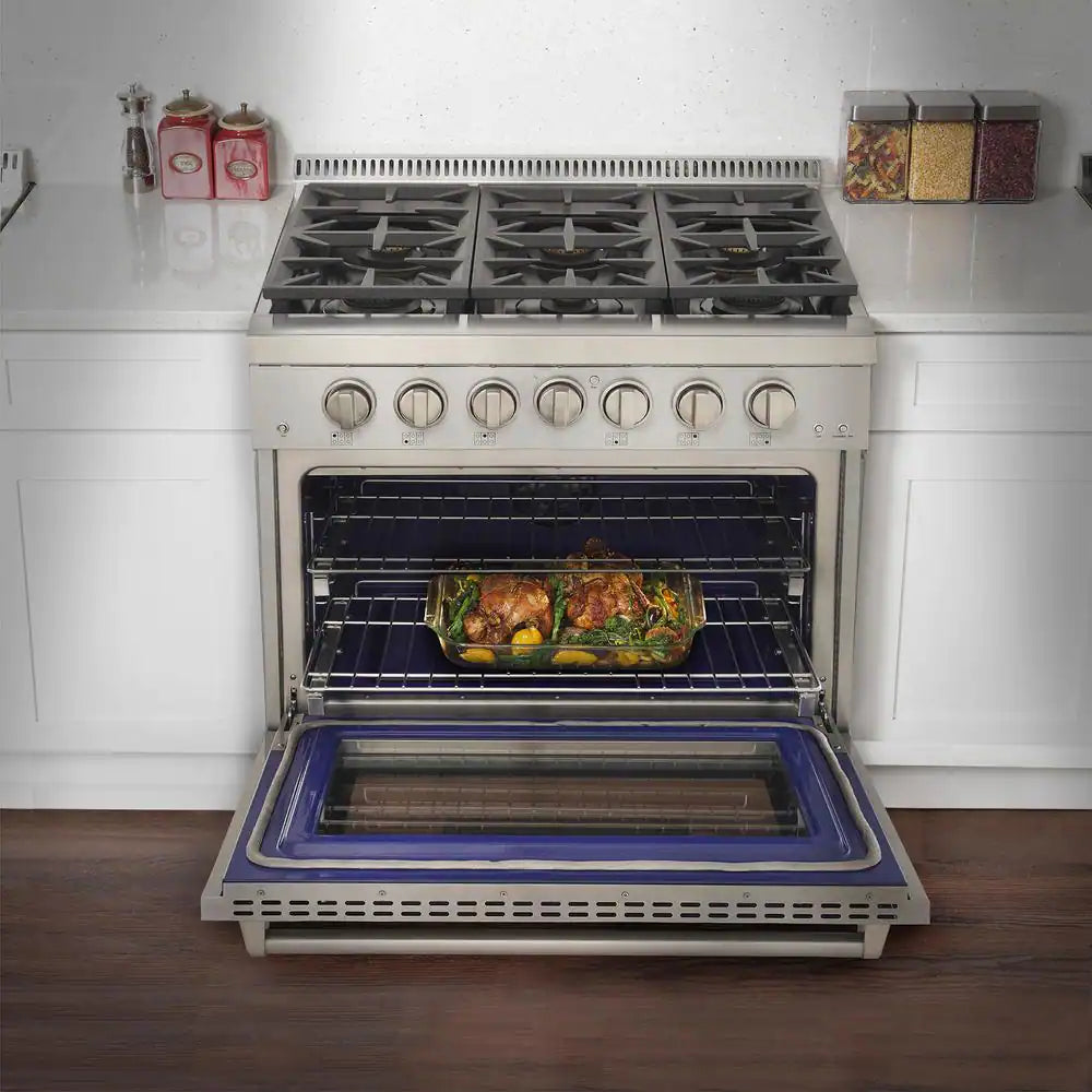 Stainless steel 30-inch gas range with blue knobs, open oven door and roasting tray