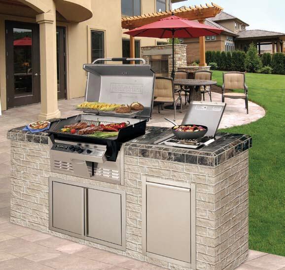 Stainless steel propane tank caddy with tilt-out doors on outdoor barbecue island