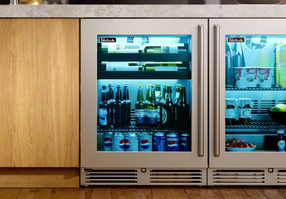 Built-in outdoor beverage center with clear glass door open, stainless frame, bottles inside