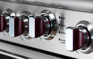 Cooktop control knobs with heat markings for burner operation