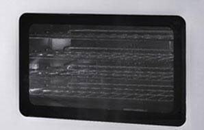 Upper oven door with dark glass window in a stainless steel frame