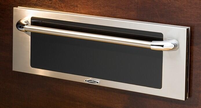 Stainless steel warming drawer with black glass front and long curved bar handle