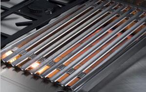 Stainless steel built-in gas rangetop with six open burners and grates