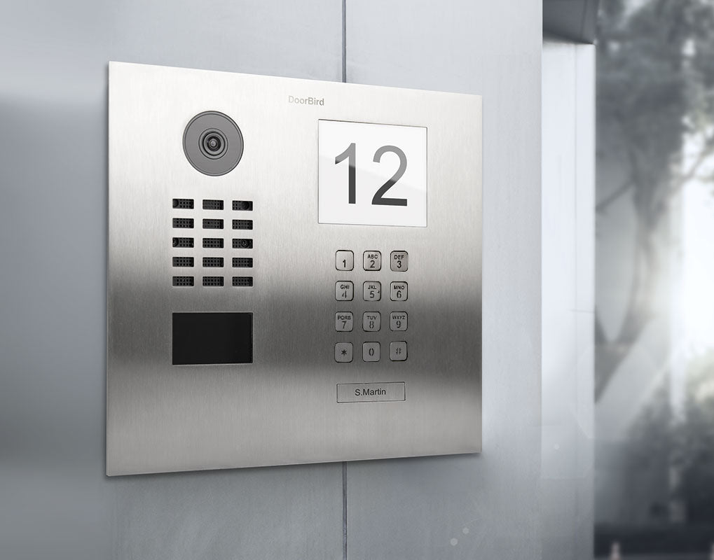 Stainless steel DoorBird video door station with camera lens, number display, and keypad
