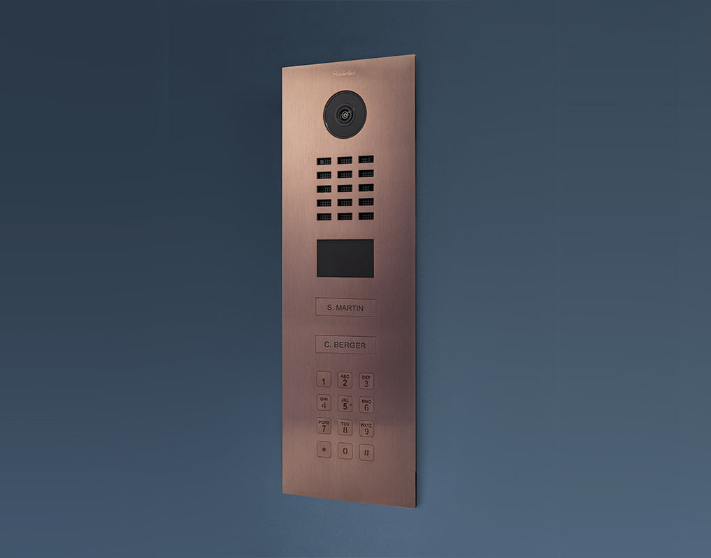 Bronze video door station panel with camera, grille speaker, and keypad