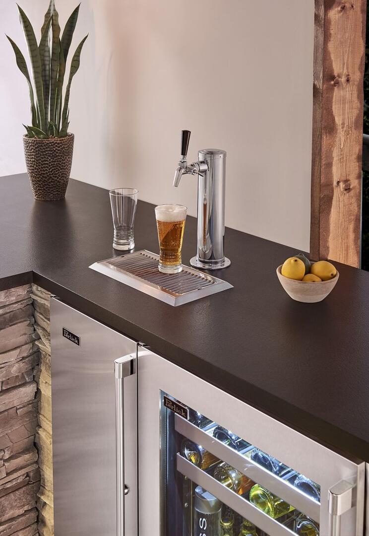 Stainless steel built-in drawer refrigerator with open door and interior glass shelves
