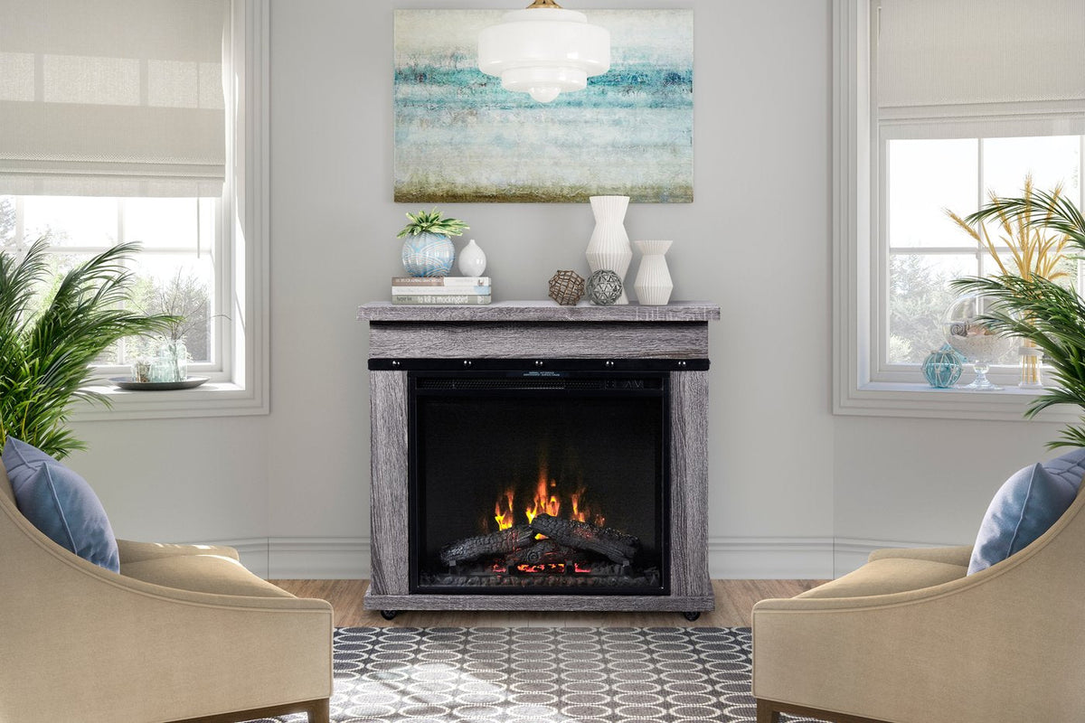 Charcoal oak electric fireplace mantel in a living room with open black firebox flames