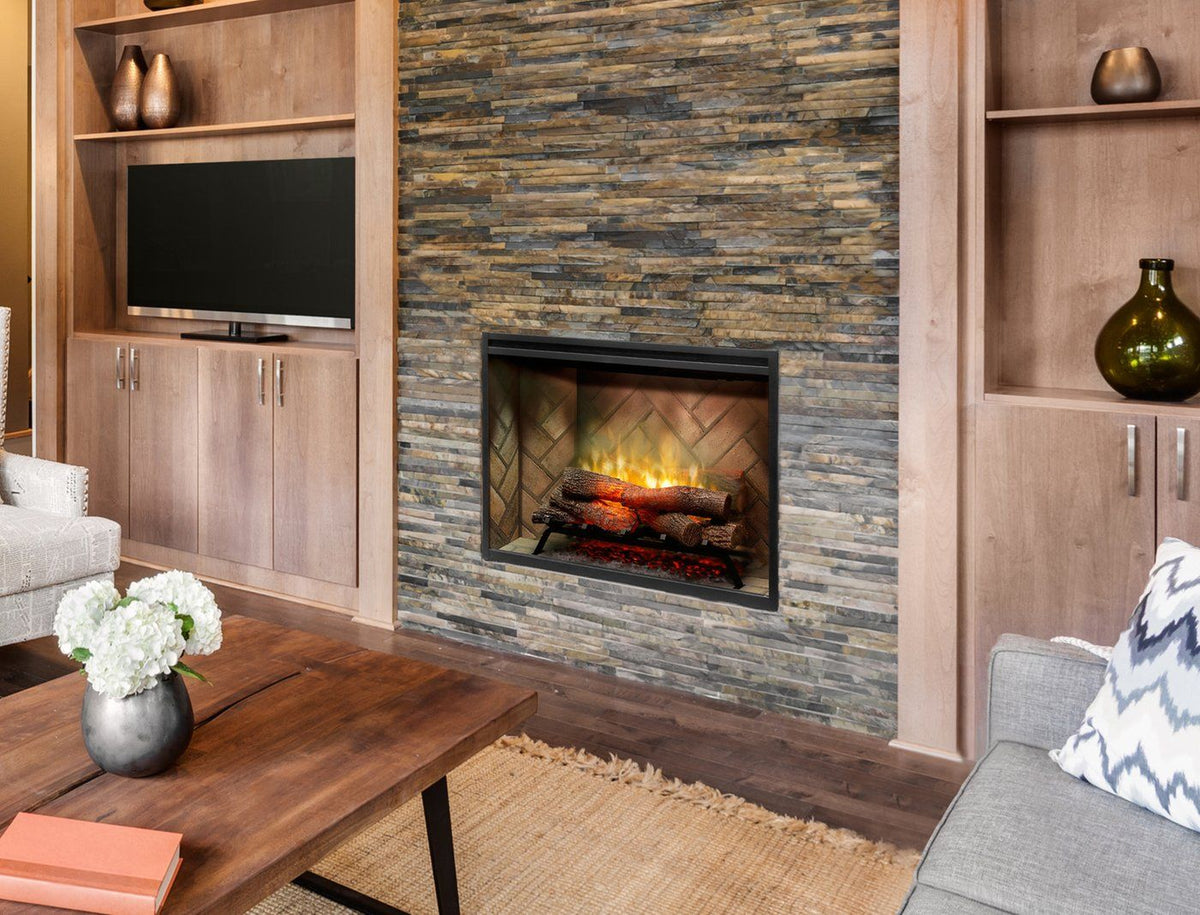 Built-in electric firebox with stone surround, burning log set and orange flames