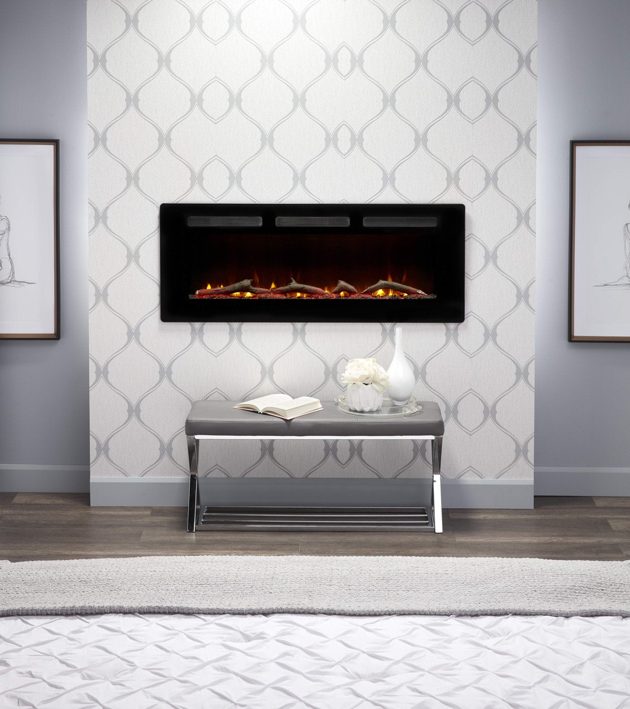 Wall-mounted black linear electric fireplace with flame window and ember bed, front