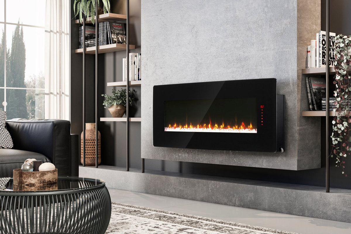 Black linear electric fireplace recessed in a wall with illuminated flame window